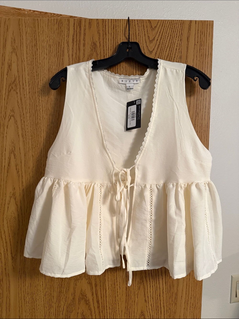 HYFVE Ivory Tie-Front Peplum Sleeveless Tunic